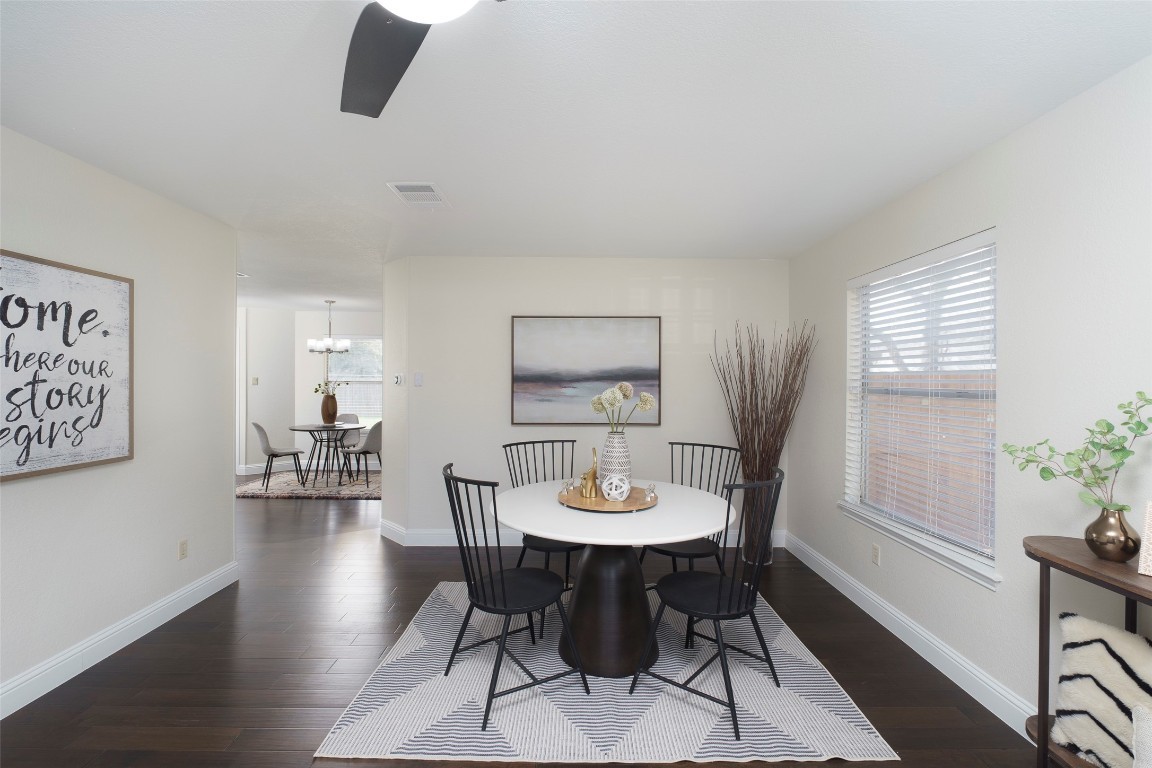 2201 Broughton Court Austin, TX 78727 - Photo 6 of 31 a view of a dining room with furniture and wooden floor