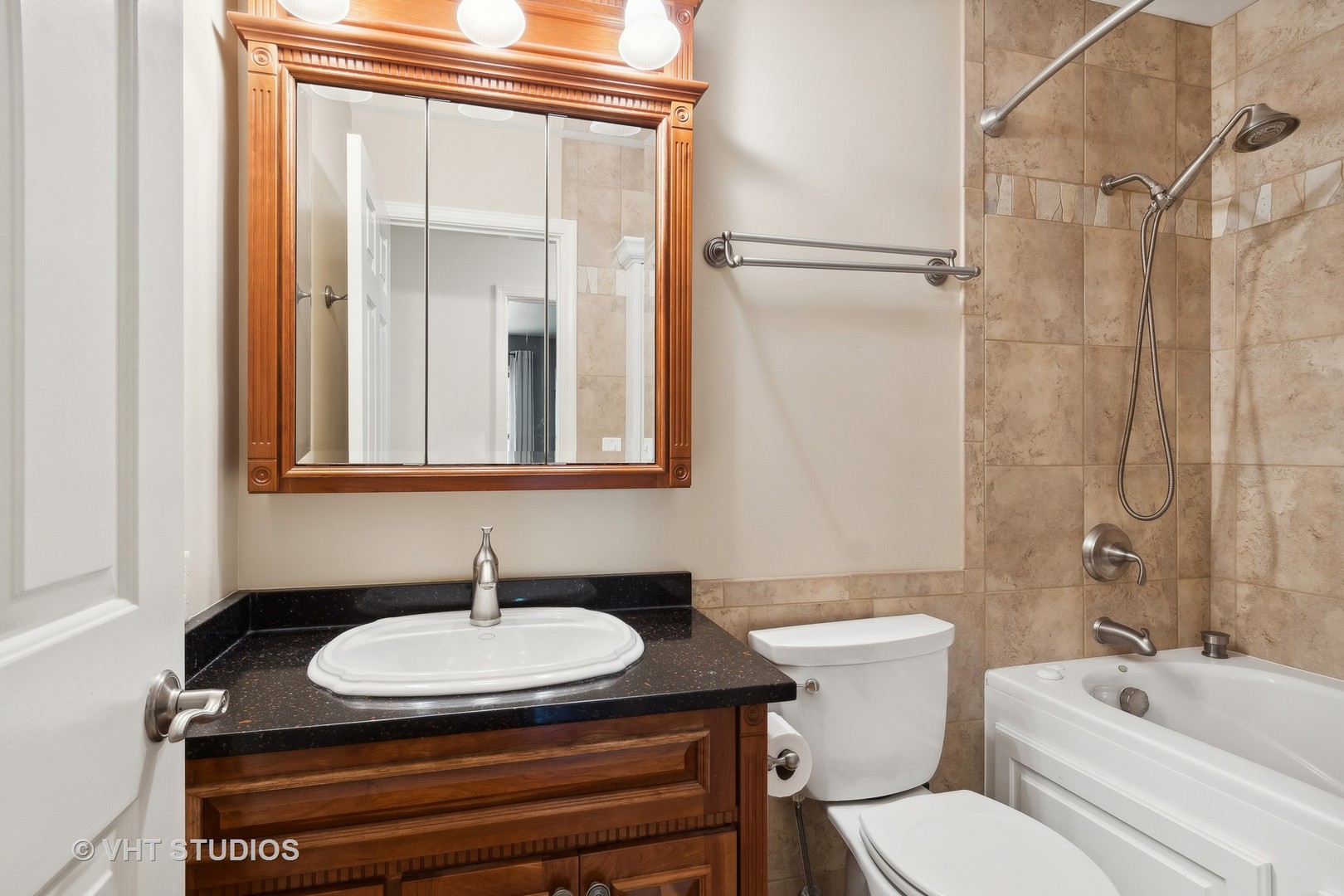 2106 Templar Drive Naperville, IL 60565 - Photo 14 of 17 a bathroom with a granite countertop sink and a mirror
