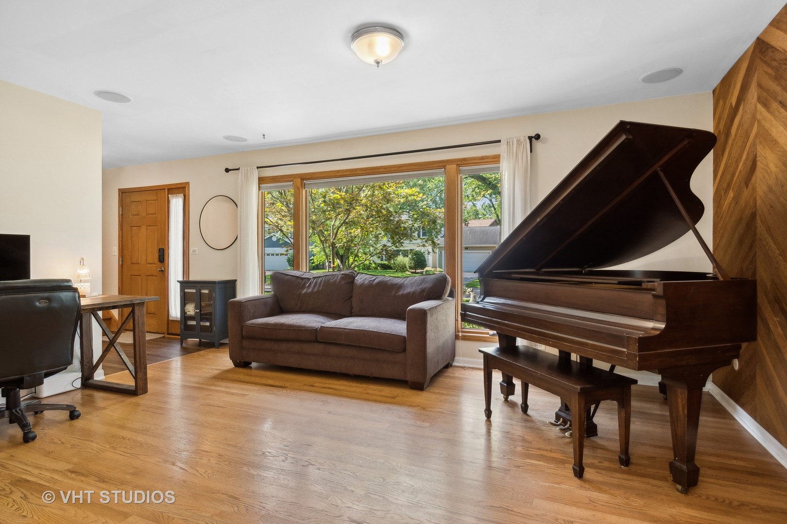 2106 Templar Drive Naperville, IL 60565 - Photo 2 of 17 a living room with furniture and a window