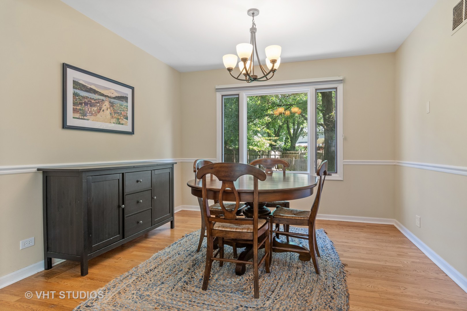 2106 Templar Drive Naperville, IL 60565 - Photo 3 of 17 a view of a dining room with furniture window and wooden floor