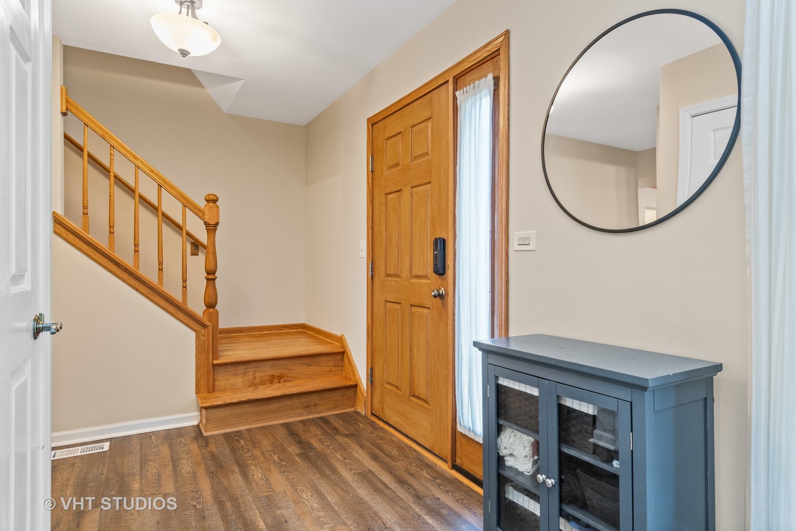 2106 Templar Drive Naperville, IL 60565 - Photo 4 of 17 a view of an entryway with wooden floor