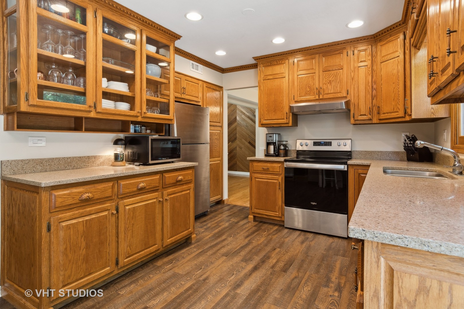 2106 Templar Drive Naperville, IL 60565 - Photo 5 of 17 a kitchen with stainless steel appliances granite countertop a stove a sink and a microwave