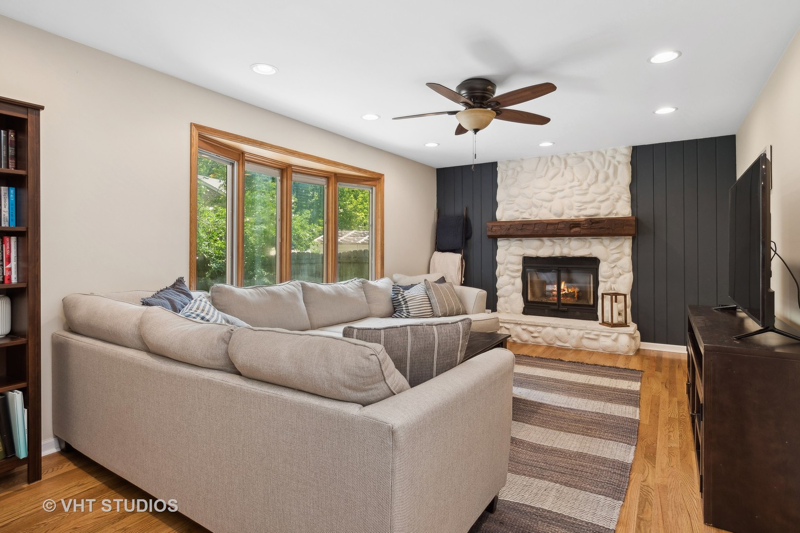 2106 Templar Drive Naperville, IL 60565 - Photo 7 of 17 a living room with furniture and a fireplace