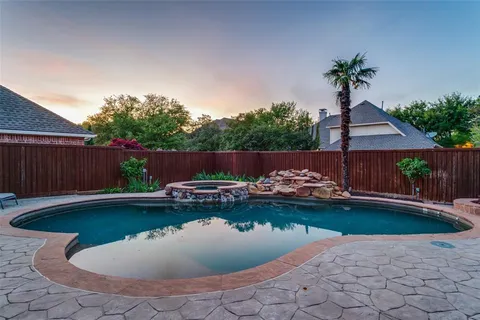 a view of swimming pool with garden