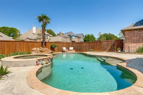 a view of a swimming pool from a balcony