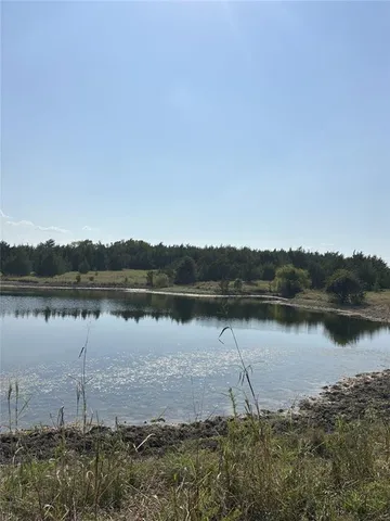 a view of a yard and mountain view