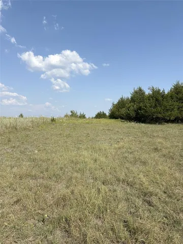 a house view with a lake