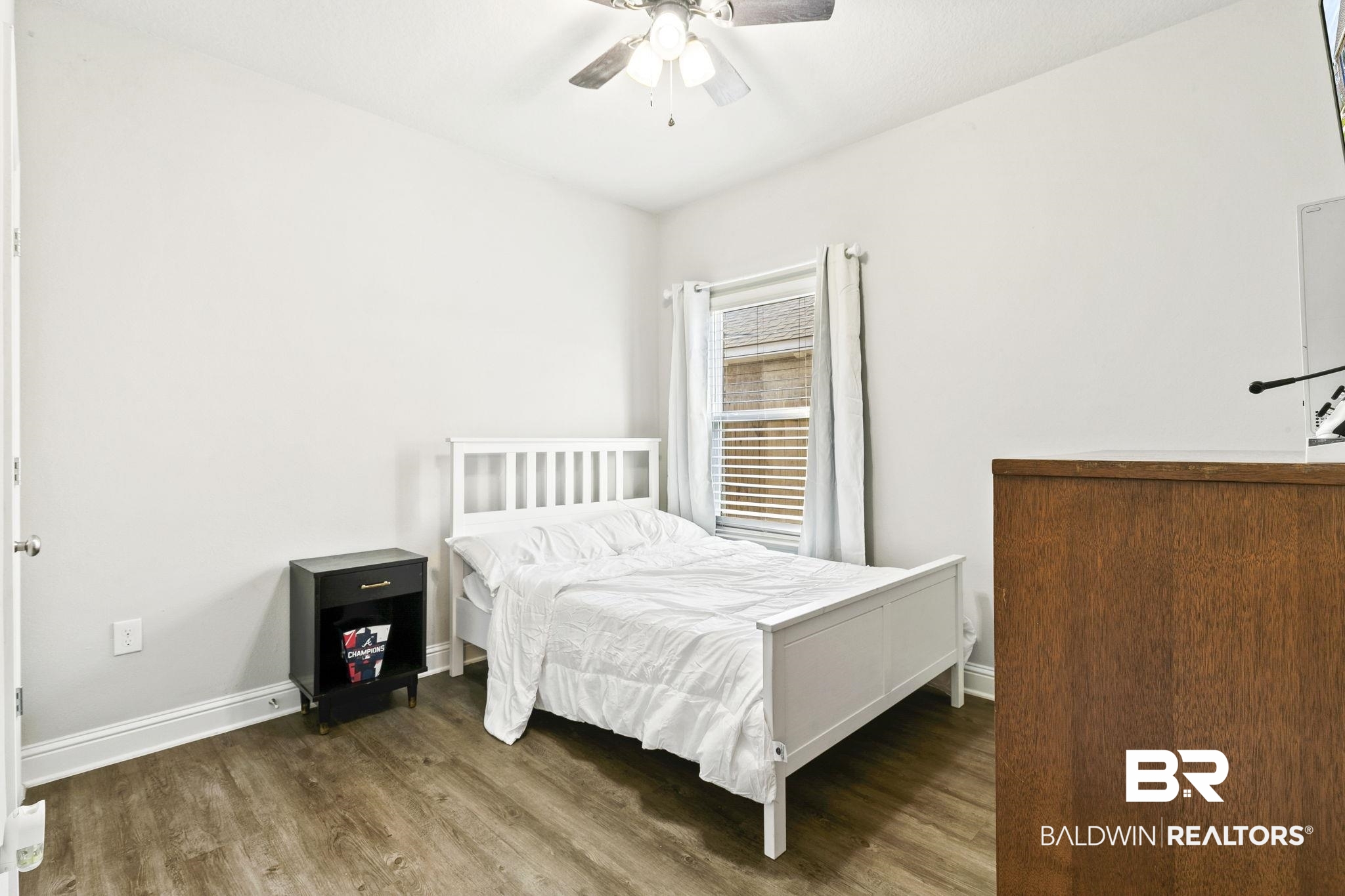 31610 Memphis Loop Daphne, AL 36527 - Photo 30 of 67 Bedroom with a ceiling fan, baseboards, and wood finished floors