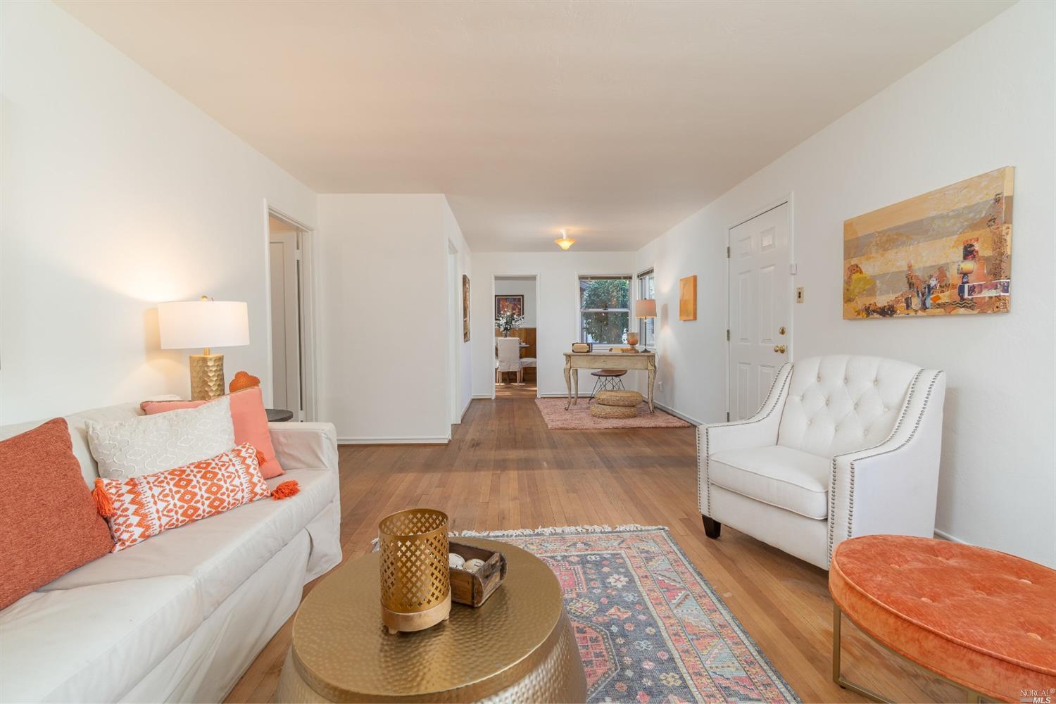 187 Butterfield Road San Anselmo, CA 94960 - Photo 1 of 1 a living room with furniture and a couch