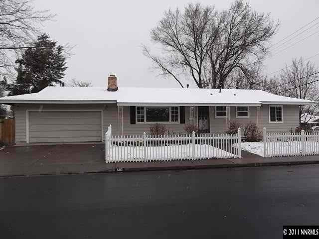 1401 Elizabeth Street Reno, NV 89509 - Photo 1 of 12 a front view of a house with a garden