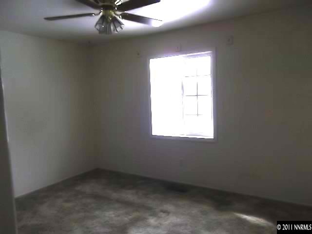1401 Elizabeth Street Reno, NV 89509 - Photo 8 of 12 an empty room with a window