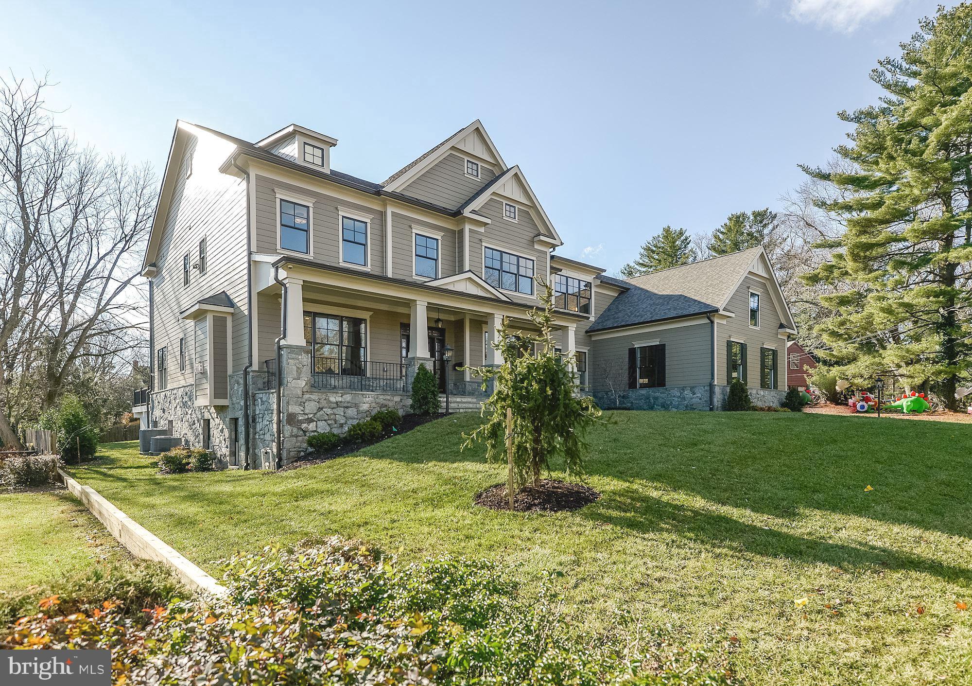 7205 Elizabeth Drive McLean, VA 22101 - Photo 1 of 39 Incredible Stonework 3-Car Side Load Garage