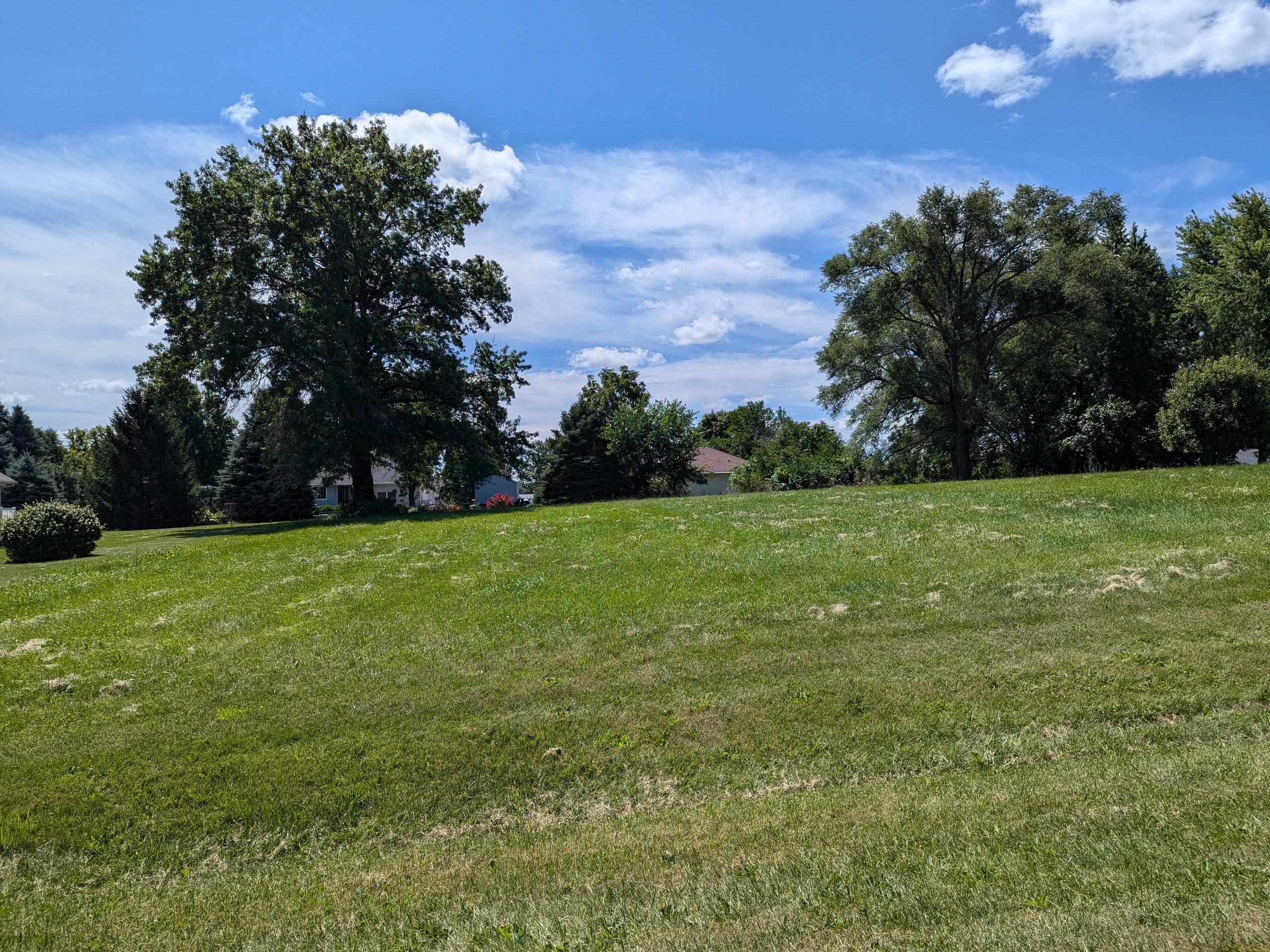 1047 Drexel Road Lake Summerset, IL 61019 - Photo 1 of 23 a view of green field with trees in the background