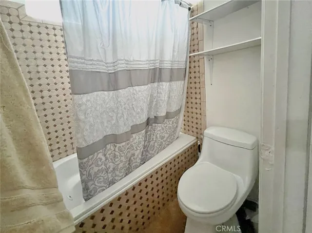 a view of a building with a yard