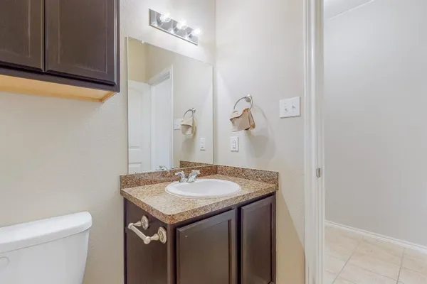 a bathroom with a sink and a toilet