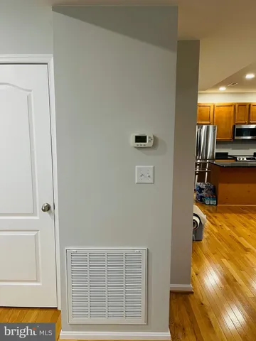a view of a livingroom with furniture and a rug