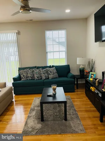 a living room with furniture and a couch