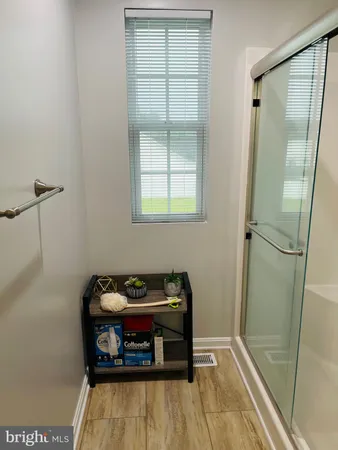 a room with a bed and a window