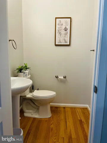 a bathroom with a toilet and sink
