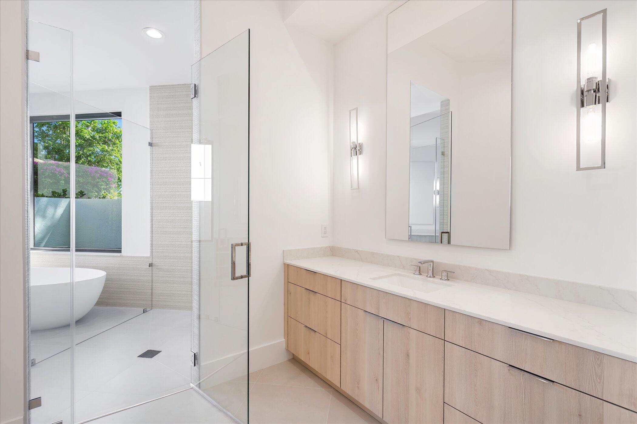 4459 Bocaire Boulevard Boca Raton, FL 33487 - Photo 43 of 72 a bathroom with a double vanity sink toilet and shower