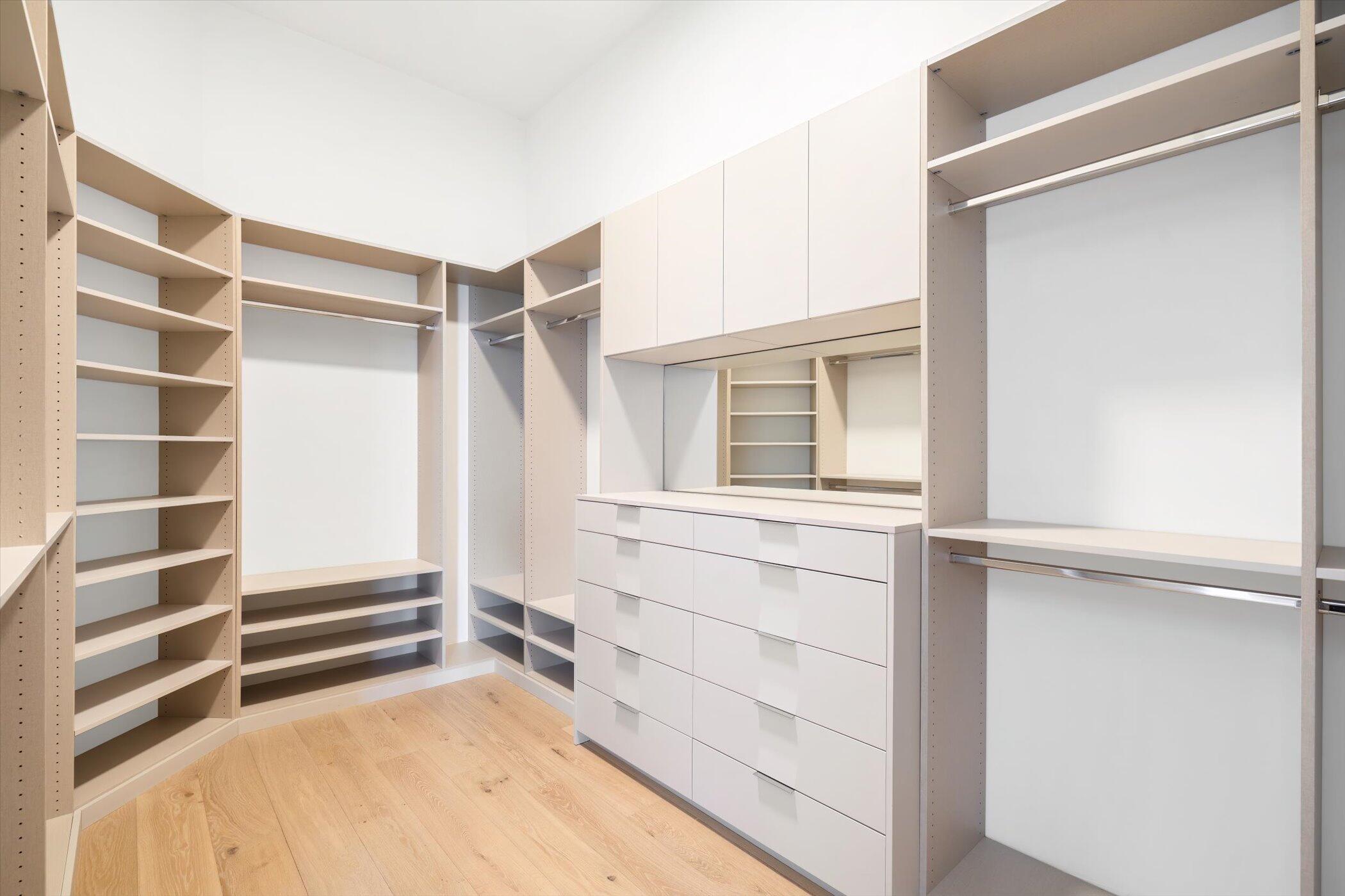 4459 Bocaire Boulevard Boca Raton, FL 33487 - Photo 44 of 72 a view of walk in closet with empty racks