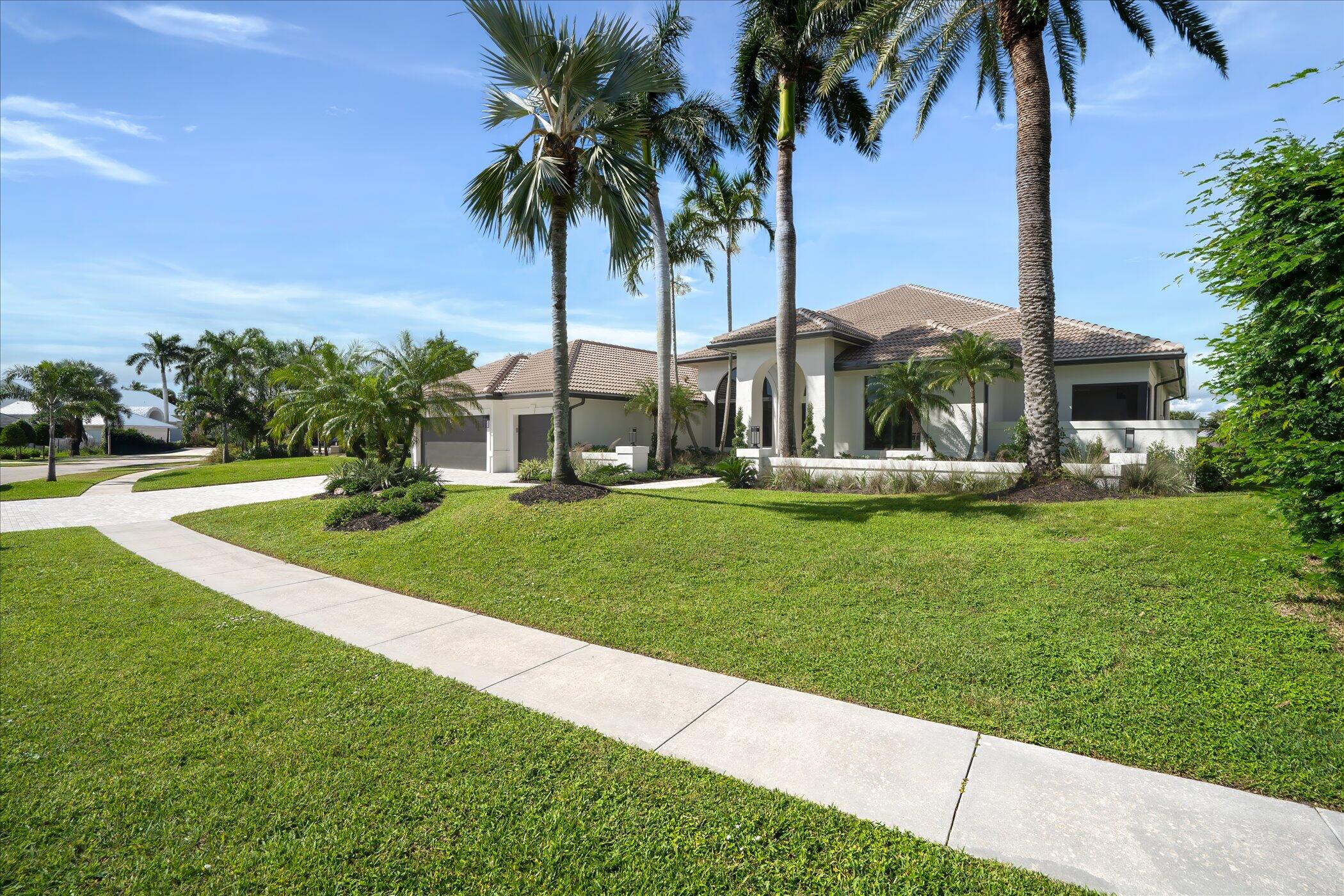 4459 Bocaire Boulevard Boca Raton, FL 33487 - Photo 5 of 72 a view of a garden with palm trees