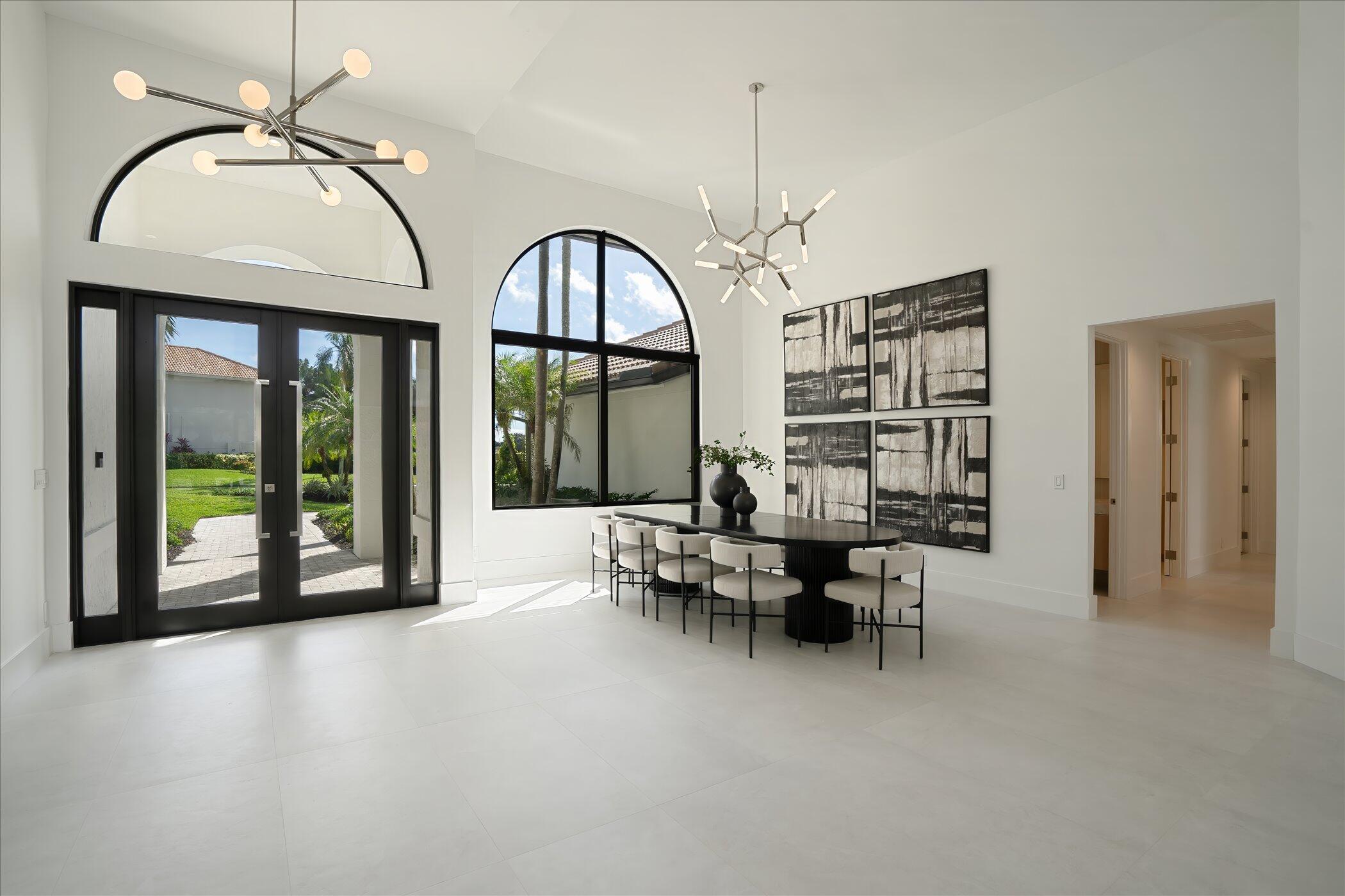 4459 Bocaire Boulevard Boca Raton, FL 33487 - Photo 9 of 72 a view of a livingroom with furniture window and outside view