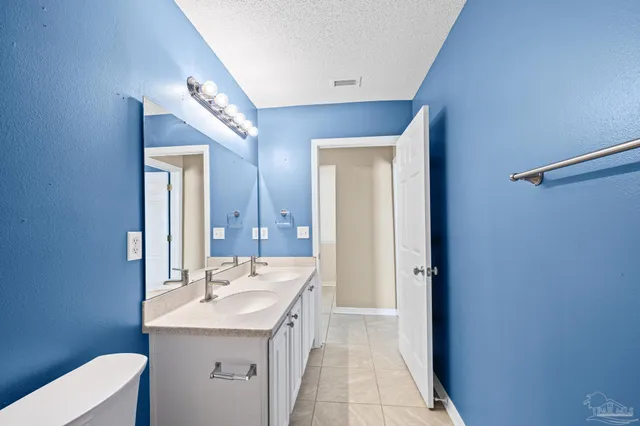 a view of a bathroom with a glass door