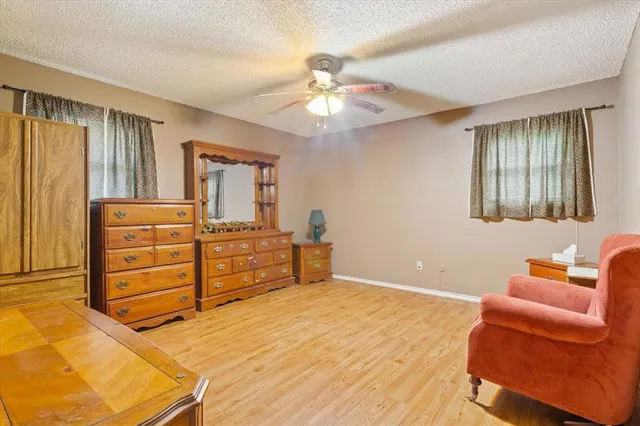 a room with a bed and furniture