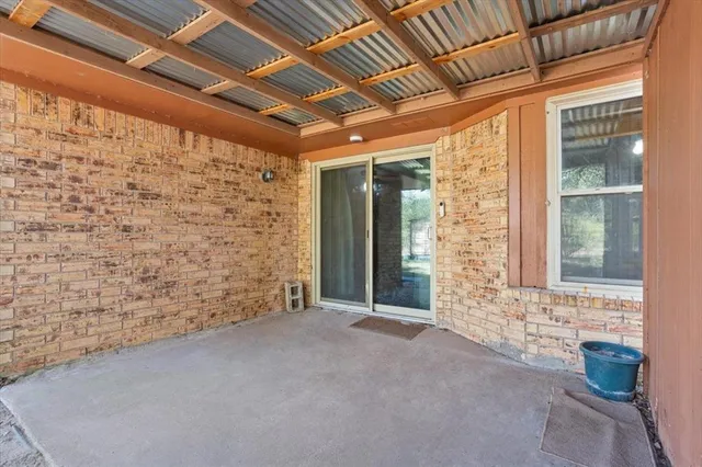 a house with trees in the background