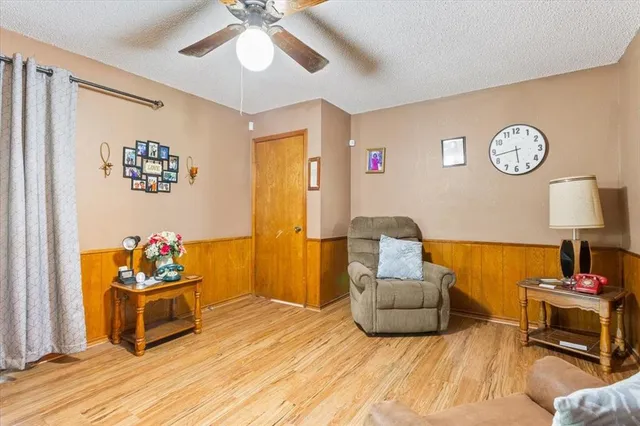 a living room with couch and a table