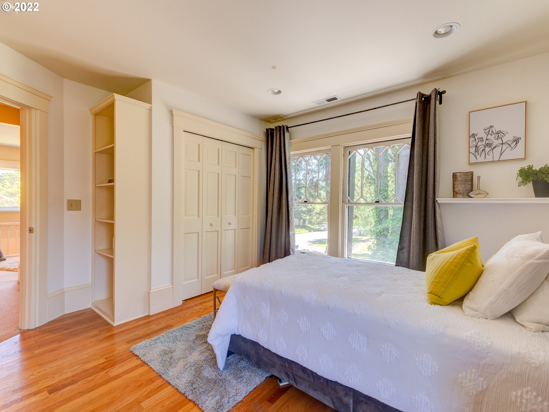 448 D Street Springfield, OR 97477 - Photo 23 of 32 a bedroom with a bed and wooden floor