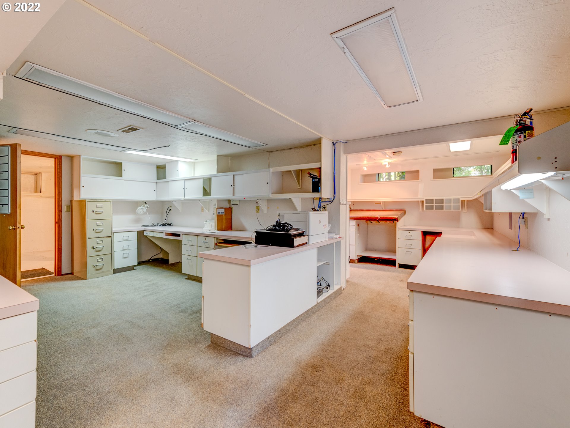 448 D Street Springfield, OR 97477 - Photo 26 of 32 a kitchen with a sink and a stove top oven