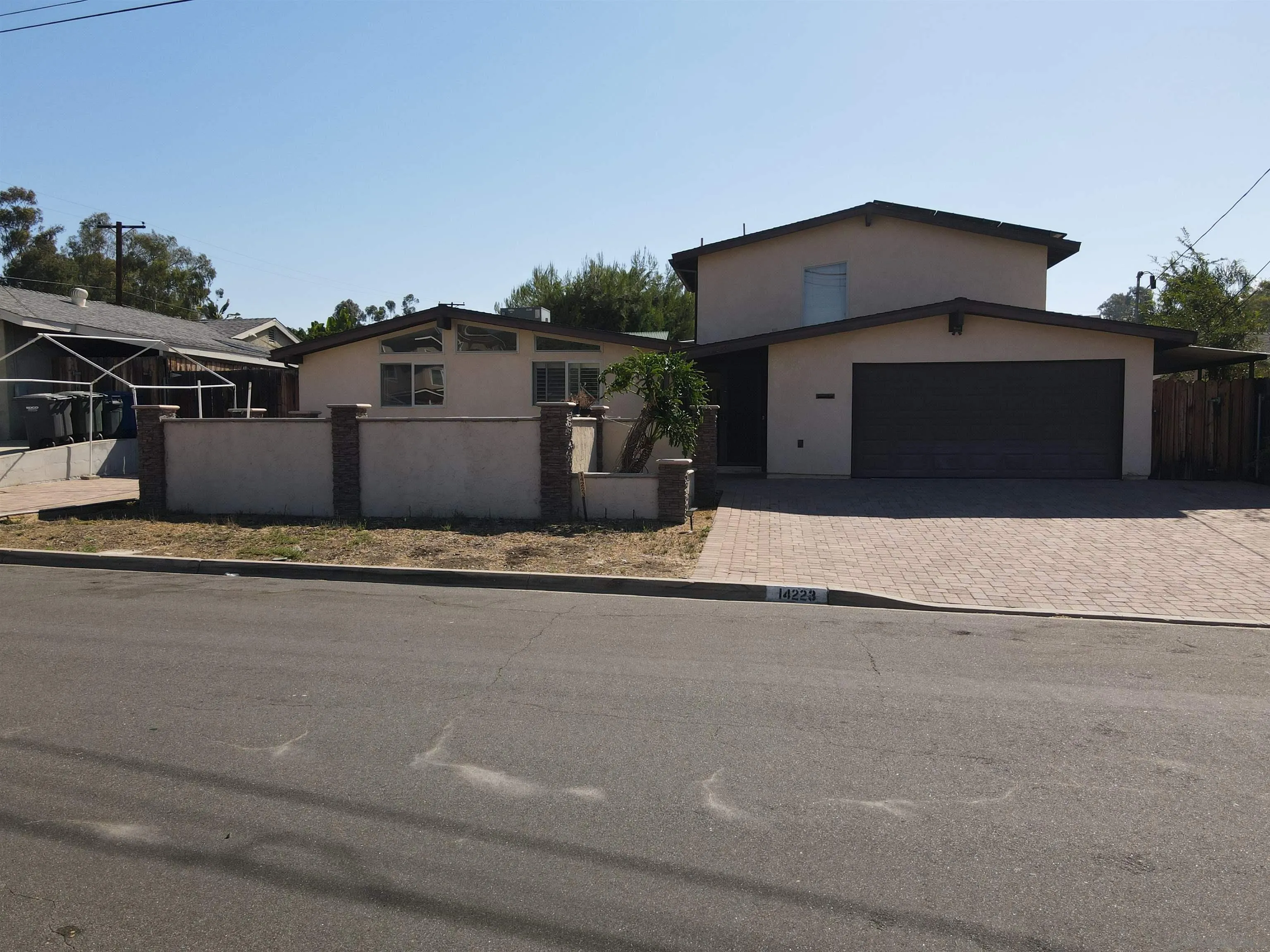 a house view with a outdoor space