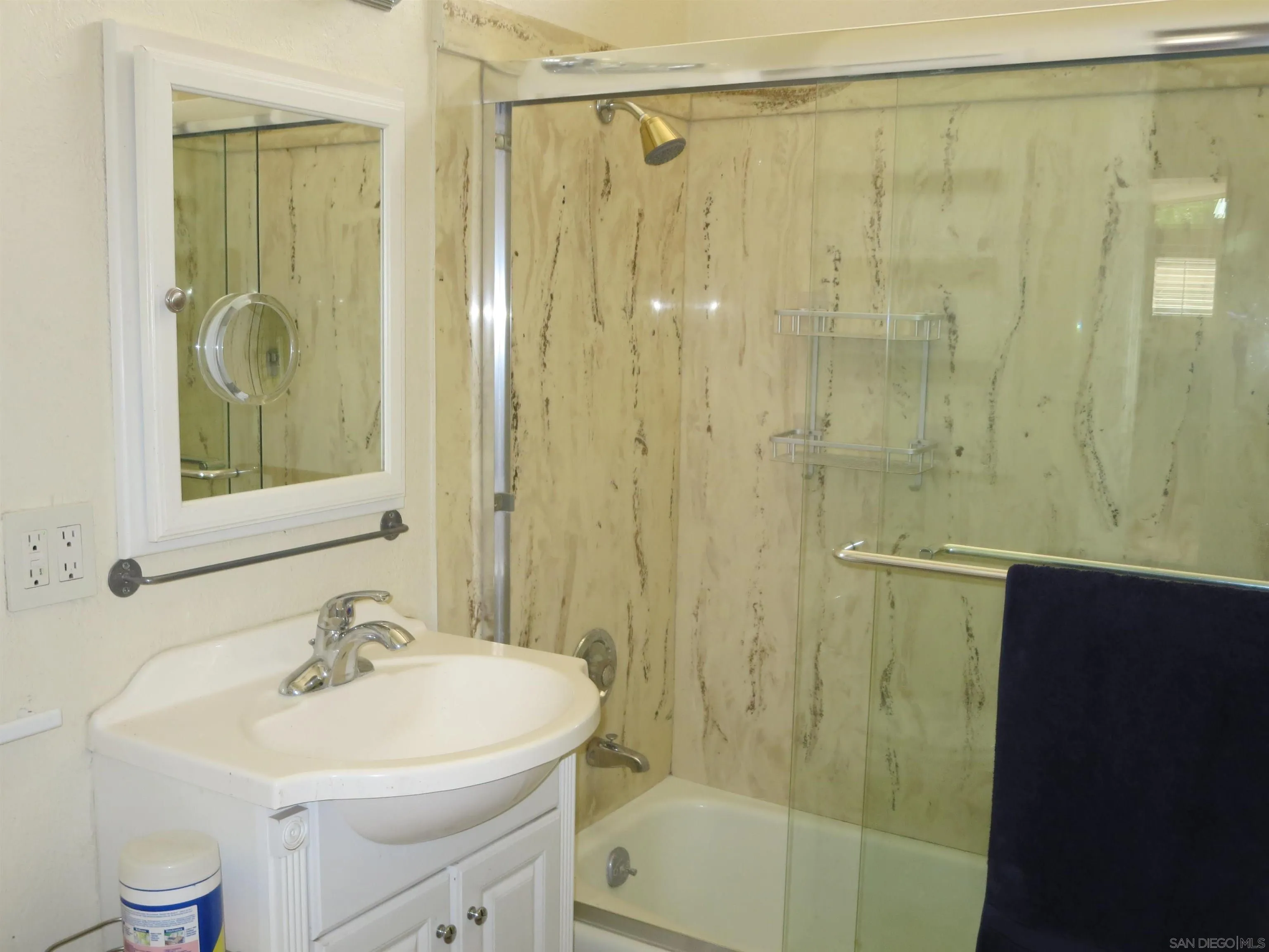 14223 Frame Road Poway, CA 92064 - Photo 19 of 44 a bathroom with a sink a toilet and shower
