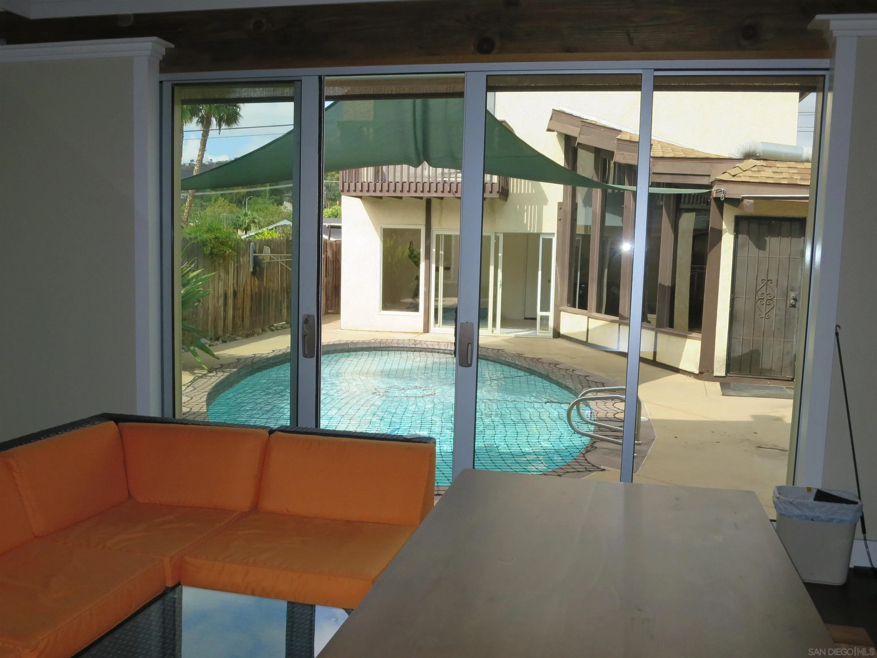 14223 Frame Road Poway, CA 92064 - Photo 38 of 44 a view of a porch with a floor to ceiling window