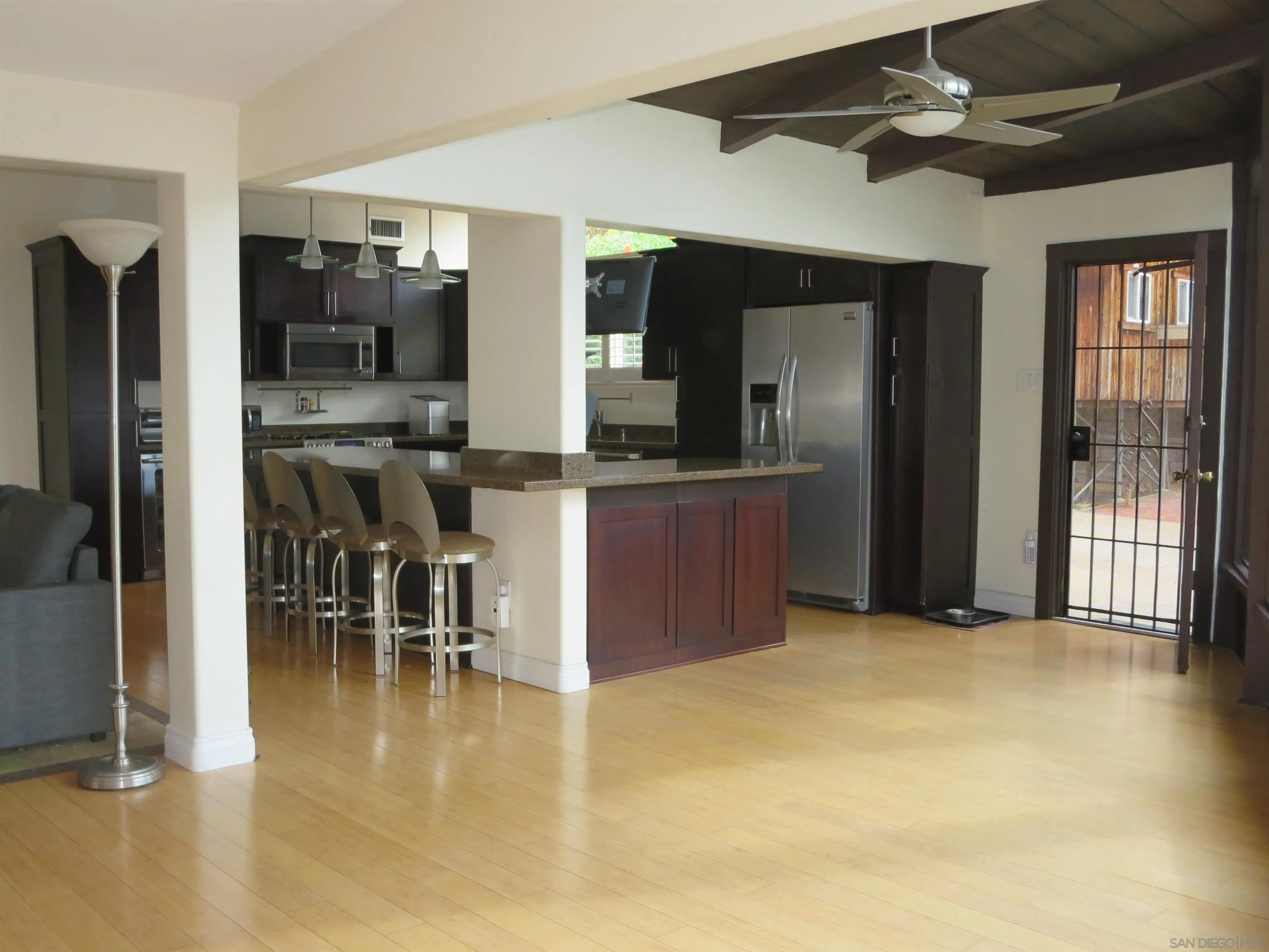 14223 Frame Road Poway, CA 92064 - Photo 6 of 44 a view of a livingroom with kitchen and furniture