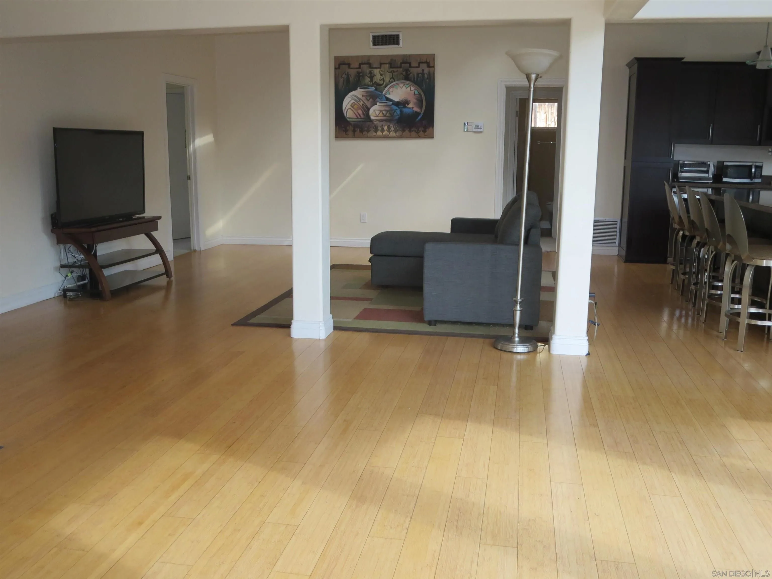 14223 Frame Road Poway, CA 92064 - Photo 7 of 44 a view of a livingroom with furniture and a flat screen tv