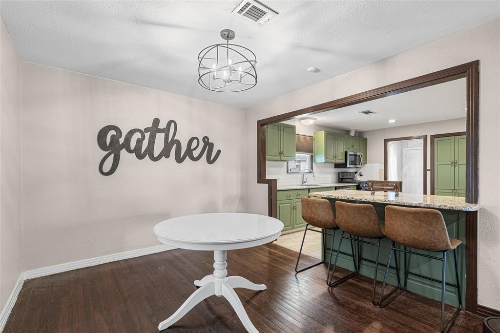 1308 Myrtle Street Denton, TX 76201 - Photo 15 of 35 a view of a dining room with furniture