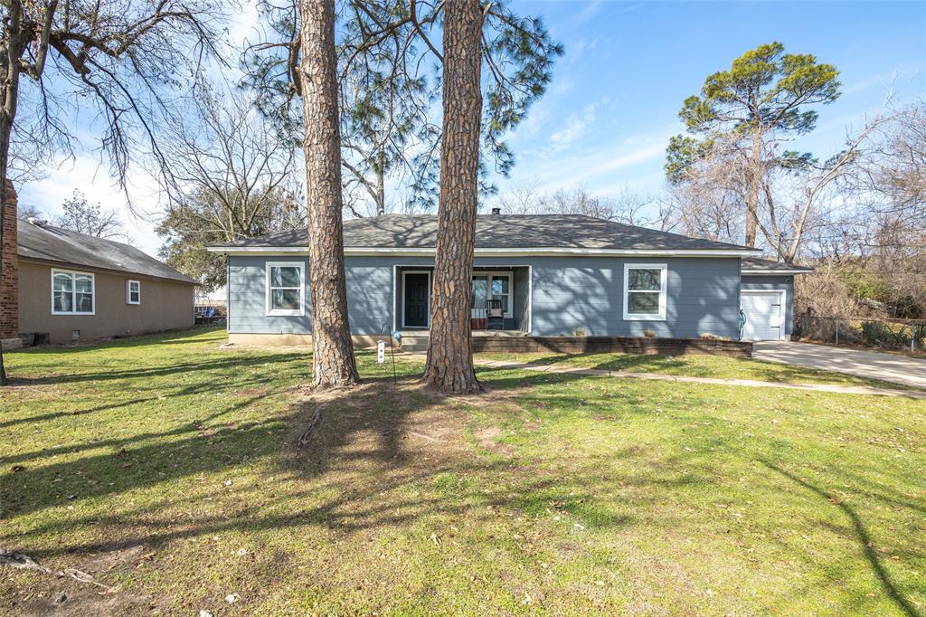 1308 Myrtle Street Denton, TX 76201 - Photo 19 of 35 a view of a house with a swimming pool