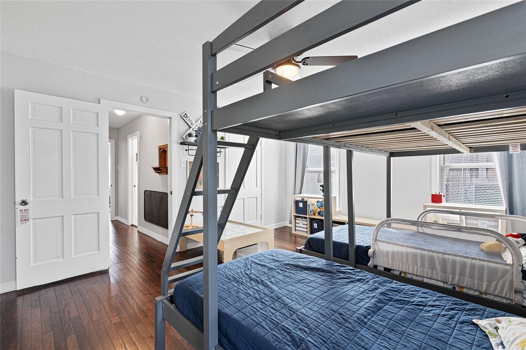 1308 Myrtle Street Denton, TX 76201 - Photo 25 of 35 a living room with furniture and a wooden floor