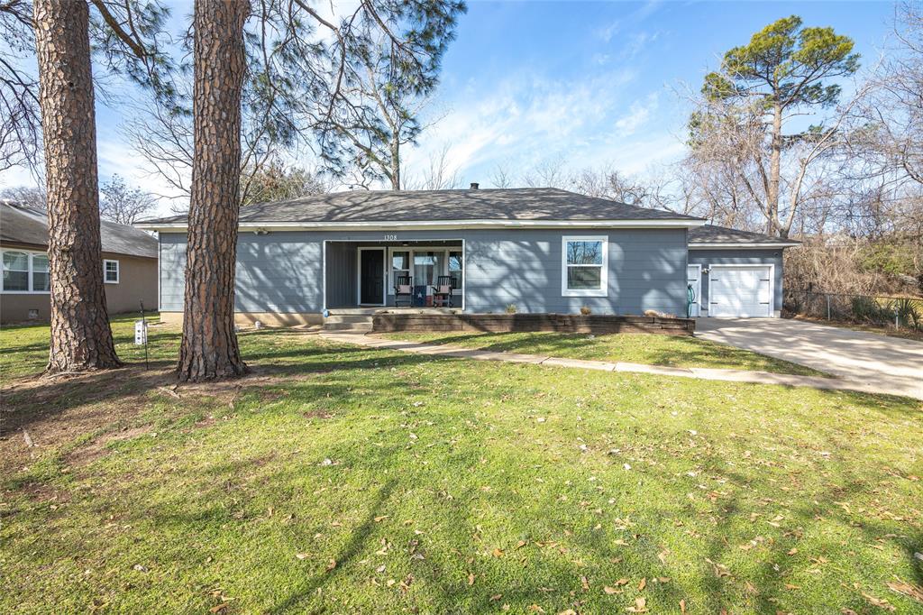 1308 Myrtle Street Denton, TX 76201 - Photo 3 of 35 a view of a house with swimming pool and porch