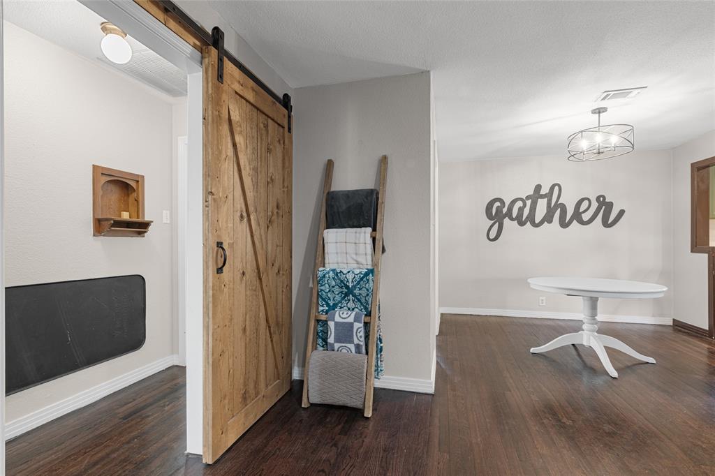 1308 Myrtle Street Denton, TX 76201 - Photo 31 of 35 a view of a livingroom with furniture and hardwood floor