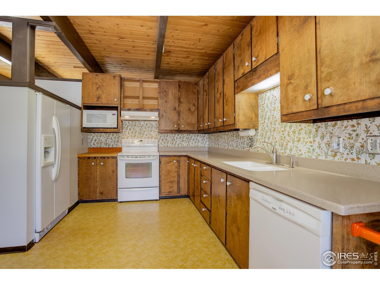 2400 Park Lake Drive Boulder, CO 80301 - Photo 15 of 32 a kitchen with stainless steel appliances granite countertop a sink and cabinets