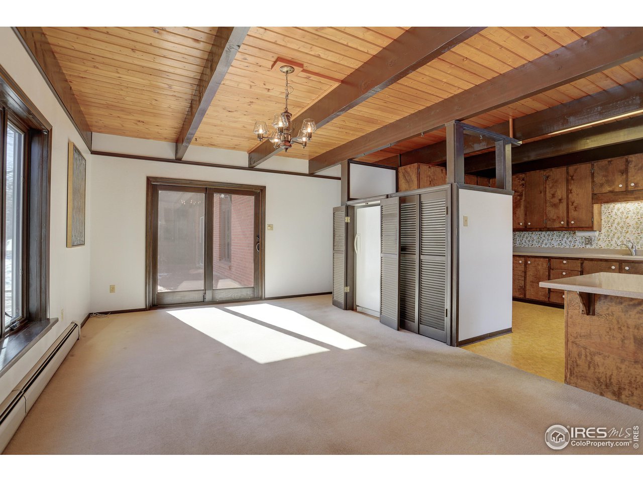 2400 Park Lake Drive Boulder, CO 80301 - Photo 16 of 32 a view of an empty room with wooden floor
