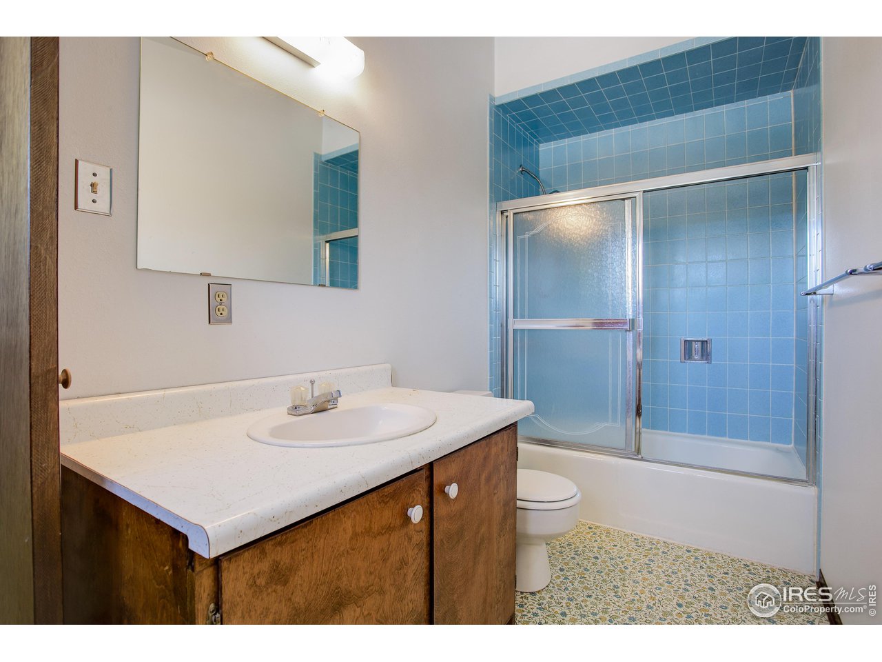 2400 Park Lake Drive Boulder, CO 80301 - Photo 20 of 32 a bathroom with a sink toilet and shower