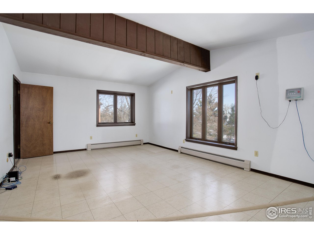2400 Park Lake Drive Boulder, CO 80301 - Photo 22 of 32 a view of a livingroom with wooden floor and cabinet