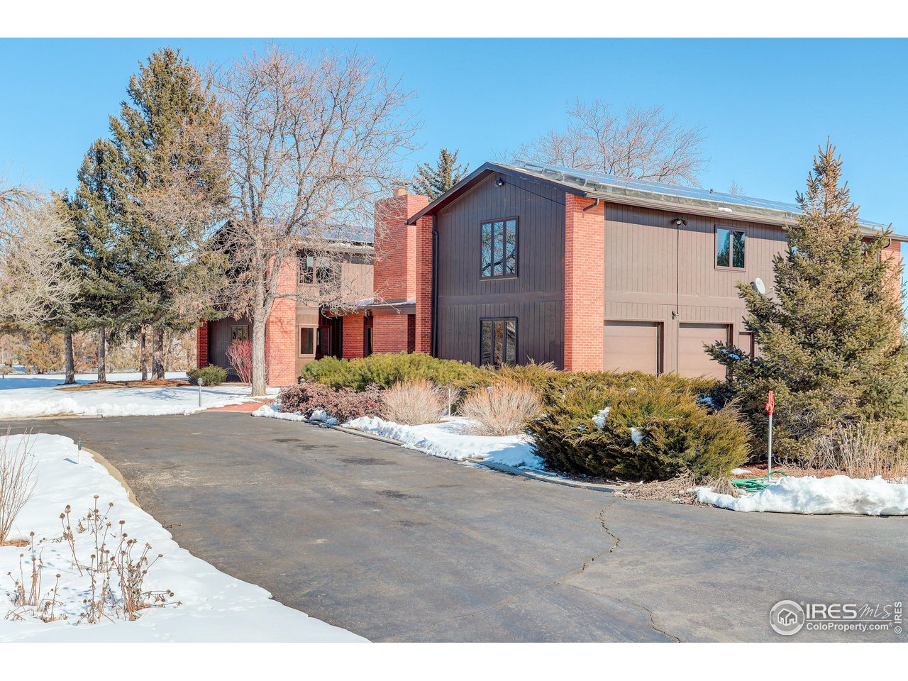 2400 Park Lake Drive Boulder, CO 80301 - Photo 28 of 32 a front view of a house with a yard