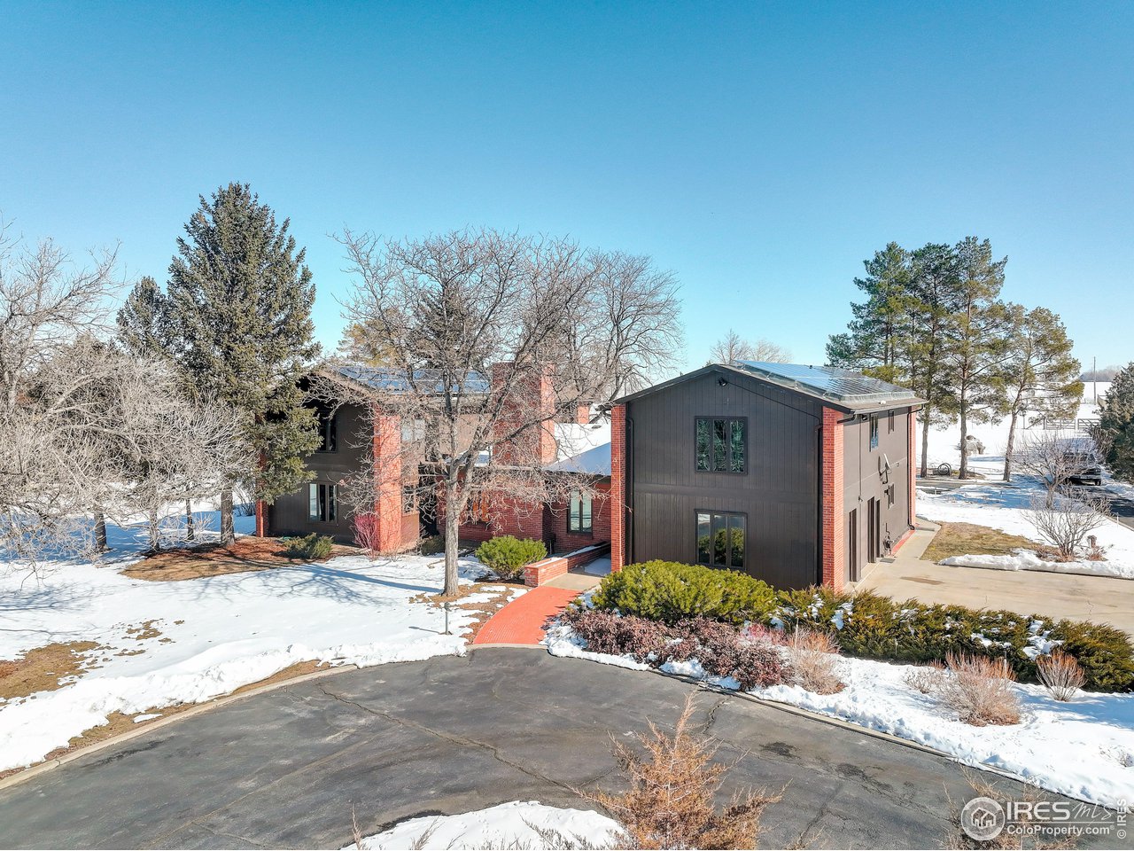 2400 Park Lake Drive Boulder, CO 80301 - Photo 5 of 32 a front view of a house with a yard