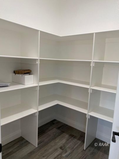 1034 Ocean Avenue Ridgecrest, CA 93555 - Photo 11 of 30 a view of walk in closet with empty racks